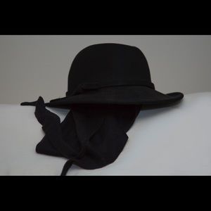 Classic hat with scarf to shield face built in